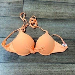 Bikini top in orange and size medium